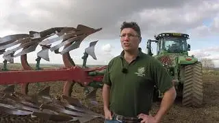 Kverneland PW 100 12 furrow plough in action at North Farm Horton, UK.