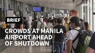 Passengers rush to Manila airport ahead of planned virus shutdown | AFP