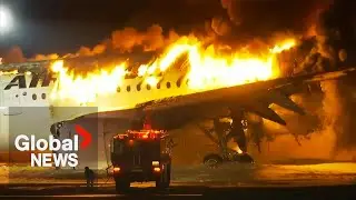 Japan Airlines plane bursts into flames in collision on runway with Coast Guard aircraft