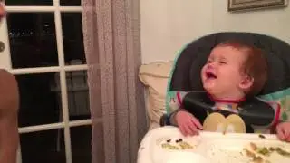 Baby Laughs at Dad's tongue