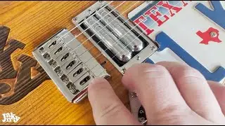 Fix your guitar's bridge saddle screws from rising