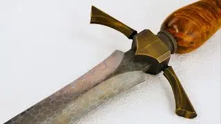 Dragonhide Damascus quillon dagger from bearing steel balls