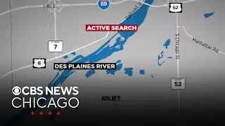 Crews try to retrieve vehicle in Des Plaines River near Joliet, Illinois