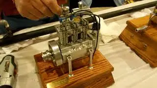 Tiny Model engine running !  3 Cylinder hand built four stroke.  Cabin Fever Expo