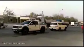 Nissan Patrol vs Ford F 150 Raptor SVT!