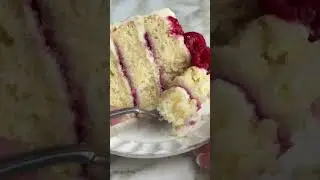 summer in cake form: lemon cake with raspberry jam and lemon cream cheese frosting. recipe below!