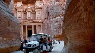 Electric vehicles replace horses in Jordans ancient city of Petra