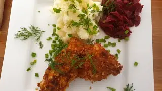 CHICKEN SCHNITZEL IN CORN FLAKES MUSH POTATOES AND BEETROOT AND EGGS