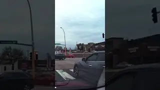 Driver is caught throwing garbage out of his car on the street 