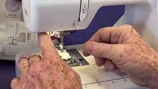 How to make a button hole on Zeal Baby Lock sewing machine Jeff shows 1-step