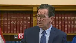 Malloy signs budget, line item vetoes hospital tax language