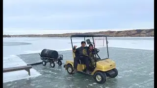 Elaborate backyard rink of dreams has a Zamboni golf cart and GT track that leads to the ice