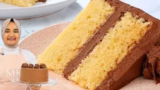 The most buttery, tender YELLOW CAKE I've ever had. With super creamy chocolate frosting!