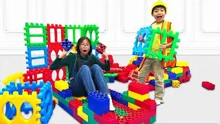 Wendy and Eric Pretend Play with Toy Blocks