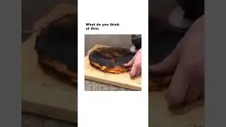 What is he doing to the Pizza? 