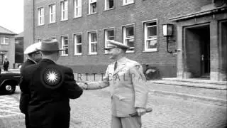 US Colonel Brooks greets Congressman Sheppard in Breverhaven, Germany. HD Stock Footage