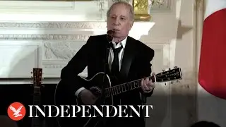 Paul Simon performs for Japan's Fumio Kishida and Bidens at White House state dinner