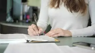 Female Hand With Pen. Stock Footage