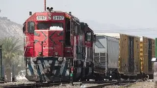The legendary SD40-2, SD70T4 with a gas tender and more train movement.