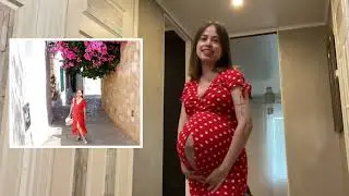 Her old dress can’t contain her twin belly