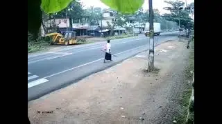 Close Call: Woman Narrowly Avoids Accident on the Road