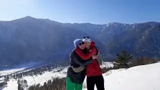 Happy travelers on top of the Serpent Mountain