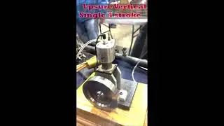 Running a homebuilt Upsure Vertical 4 stroke model engine at Cabin Fever Expo.