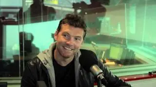 Sam Worthington smitten by Lara Bingle