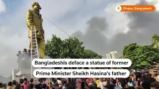 Bangladeshis take sledgehammer to golden statue of founder | REUTERS