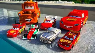 Disney Pixar Cars falling into deep pool, Lightning McQueen, Tow Mater, Mack, Sally, Francesco