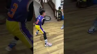 912,Shaq vs her litter brother playing basketball