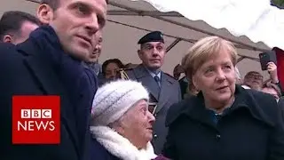 Old lady mistakes Chancellor Merkel for Macron's wife - BBC News