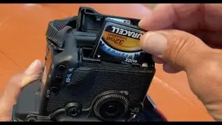 How to insert and remove a CF card from a Canon EOS 5D SLR Camera