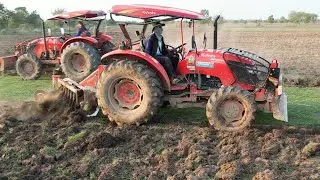 Great Powerful Tractors In The Field And Plowing An Area Of Plowing of Fieldland