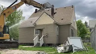 Nice little house demolished by a nice little excavator