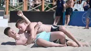 U17 Karl Markus Melnits (EST) vs Martin Vinokurov (EST) 60kg. Boys youth beach wrestling.