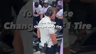 Tom Cruise tires a Formula 1 pitstop 