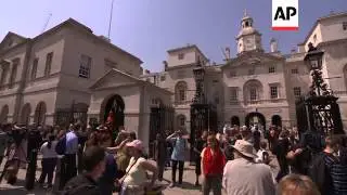 MOUNTIES TAKE PART IN QUEENS DIAMOND JUBILEE CEREMONY NEAR PALACE