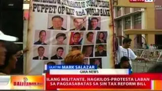 BT: Ilang militante, nagkilos-protesta laban sa pagsasabatas ng sin tax reform bill