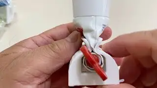 Toothpaste Squeezer with Rolling Dispenser