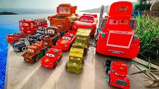 Disney Pixar Cars falling into deep pool, Lightning McQueen, Tow Mater, Mack, Sally, Francesco