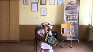 8-year-old girl playing harmon, 