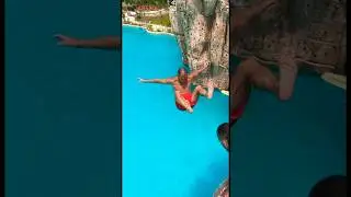 Ouch Cannonball off a high platform in water park Blue Tree Phuket