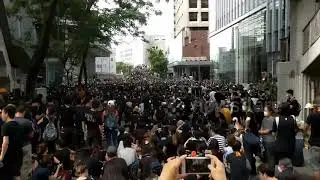 Massive crowds gather outside Hong Kong police headquarters