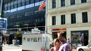 US flag at Berlin's Checkpoint Charlie at half-mast