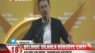 BELİNDE SİLAHLA KÜRSÜYE ÇIKTI