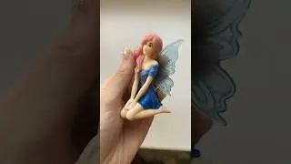 A fairy with pink hair 