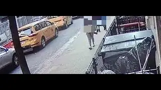 Shocking moment BMW driver jumps sidewalk and crashes into a father and son in Manhattan