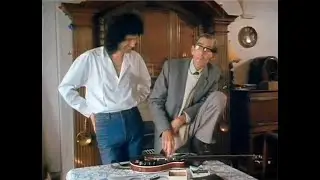 Brian May and his Dad, Harold May showing Red Special Guitar