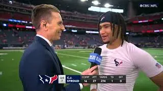 C.J. Stroud speaks to Evan Washburn after the win against Denver